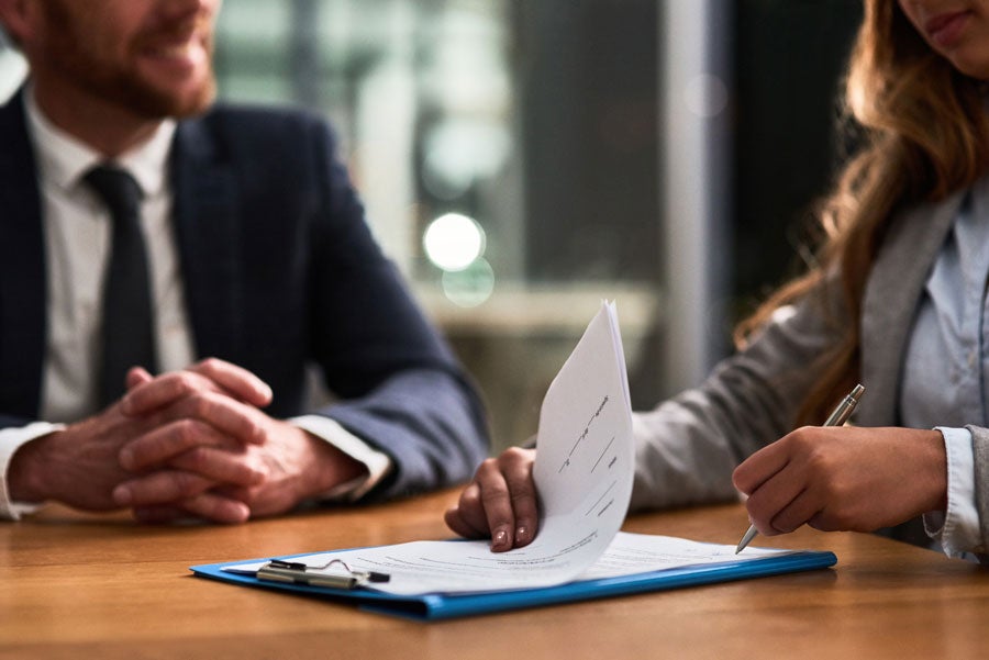 Nelson Jones Legal attorneys meeting with clients